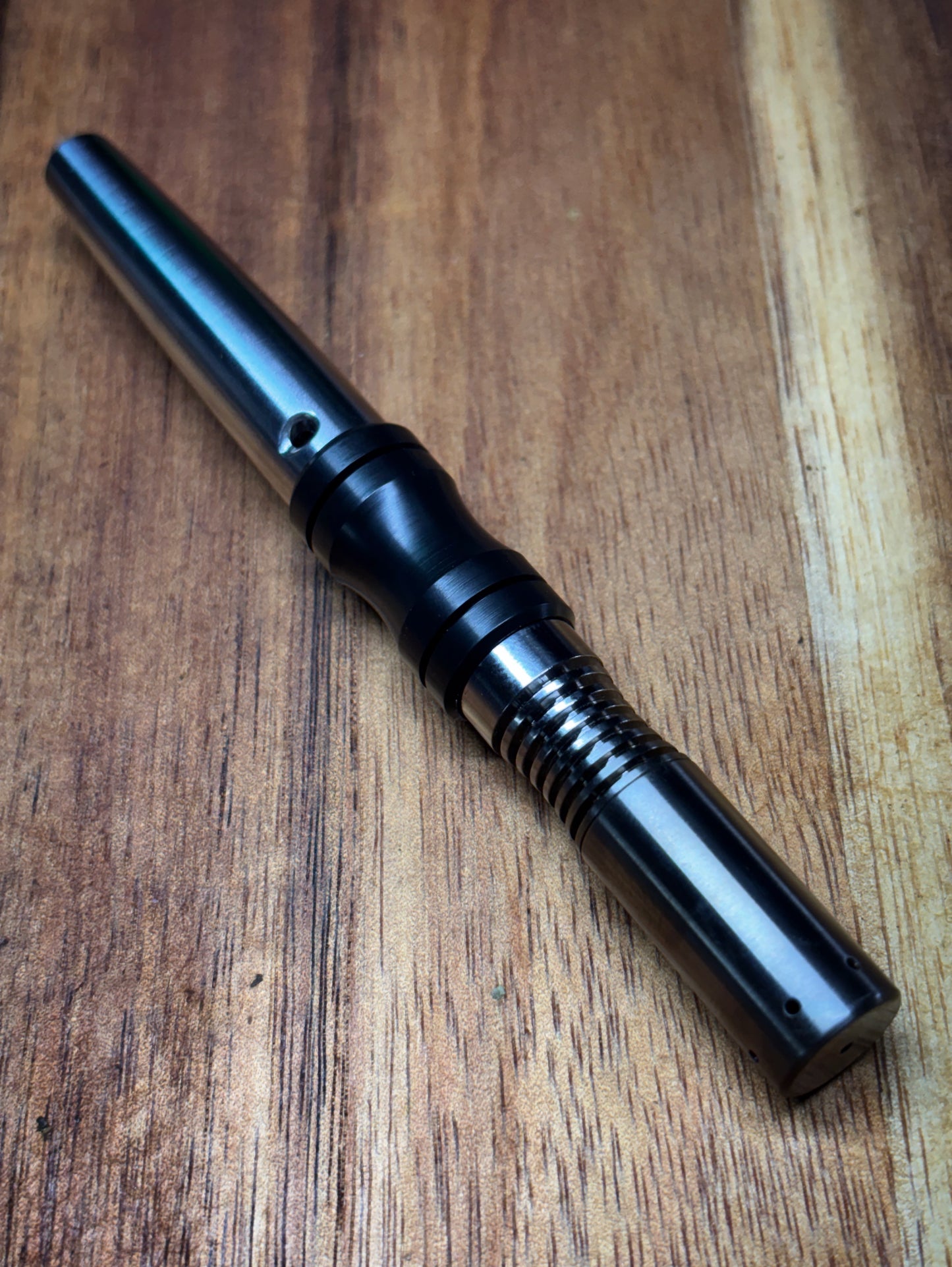Black Delrin sleeve for The Simrell