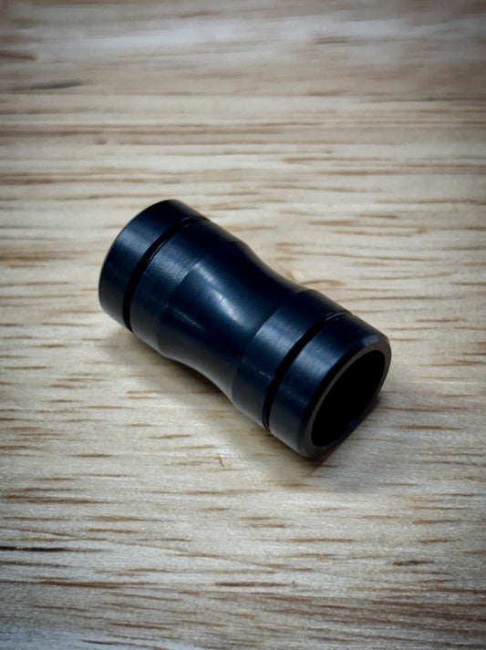 Black Delrin sleeve for The Simrell